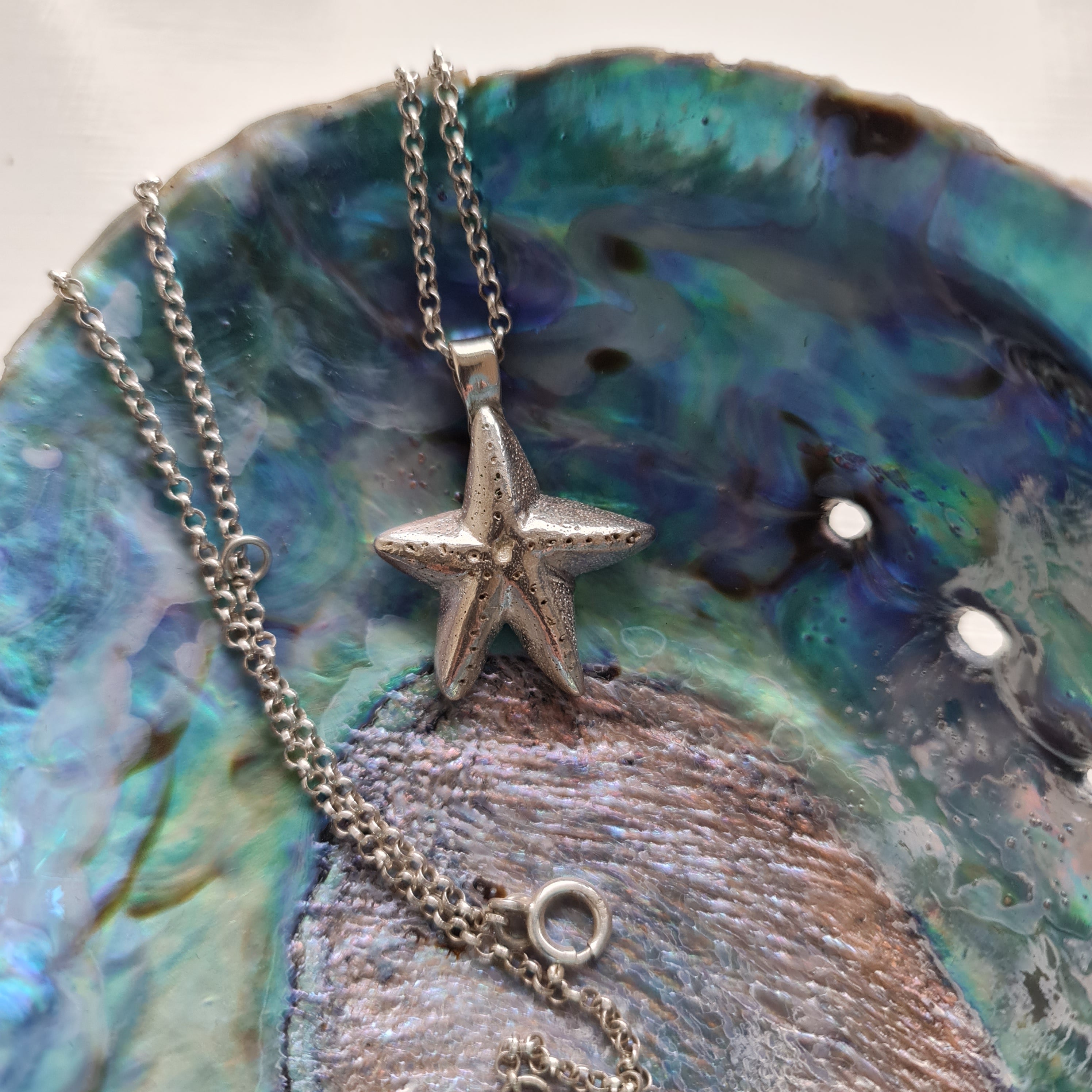 Auckland Jeweller, Swanson Jeweller, Silversmith, sea jewellery, New Zealand jeweller, starfish jewellery, silver starfish necklace, silver necklace, hand carved jewellery, sea jewellery